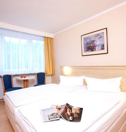 AHORN Hotel Am Fichtelberg.Family Room.hotels/8c8d5c1b7e85d5d7003a179cecc4716c781bb394/room/ahorn-hotel-am-fichtelberg-family-room-57898.jpg