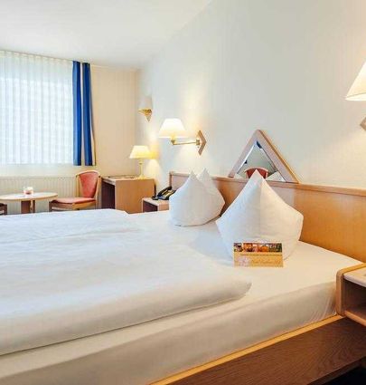 Hotel Rathener Hof.Doppelzimmer.hotels/91cf569f0df7c4428d41fcc9d1176402c80ceef9/room/hotel-rathener-hof-doppelzimmer-75808.jpg