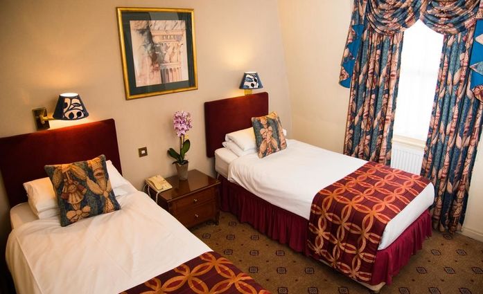 London Lodge Hotel.Doppelzimmer.hotels/0bb6e4f1423682b39f01e3644ec0e5c57b5bb645/room/london-lodge-hotel-doppelzimmer-75542.jpg