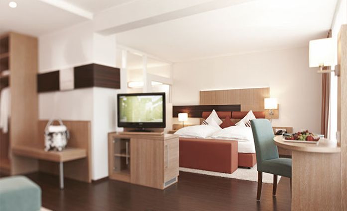 Hotel Kunzmann's.Kunzmann's Suite.hotels/2f392919f7f3e9c24e50a48ffbe91ae045baf565/room/hotel-kunzmanns-kunzmanns-suite-24014.jpg