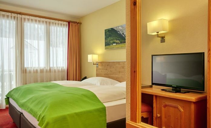H+ HOTEL Sonnwendhof Engelberg.Doppelzimmer.hotels/4f3f1a2cb9d110e344183ad4c0bafe1bfd01d060/room/h-hotel-sonnwendhof-engelberg-doppelzimmer-64745.jpg