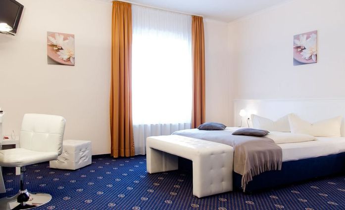 Stadthotel Gersthofen.Doppelzimmer.hotels/5dbd2947520001468a6170e4da040720c878cb8d/room/stadthotel-gersthofen-doppelzimmer-98320.jpg