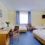 Hotel Zwickau Mosel.Vierbettzimmer.hotels/9581e39b2056ac97e9334c758e95e9d95aed12a2/room/hotel-zwickau-mosel-vierbettzimmer-94402.jpg